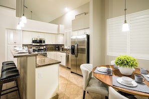Upgraded kitchen with quality appliances.