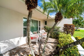 Beautiful front patio offers south facing vantage point