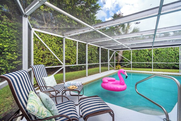 Fenced in backyard and huge beautiful hedges offer private relaxation year round