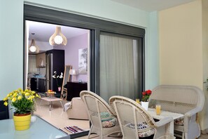 Veranda for relaxing moments to eat drink or read a book near the swimming pool