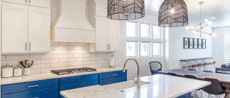 Kitchen View - This sleek, modern kitchen has all the best upgrades to make cooking a breeze!