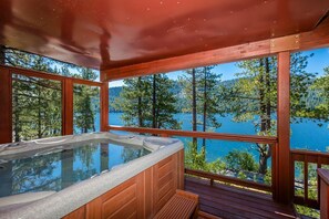 Enjoy the hot tub from the covered deck off the bedroom floor