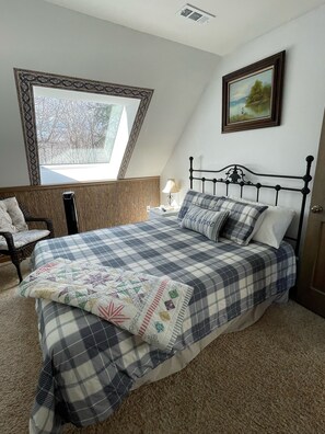 One of two second floor bedrooms.