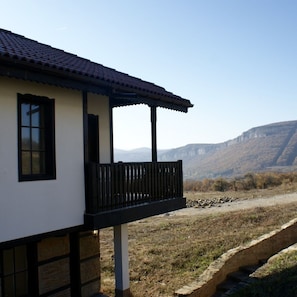 Front bedroom balcony with mountain views beyond