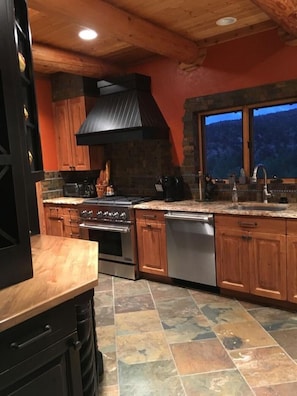 Gourmet kitchen with wine refrigerator. 