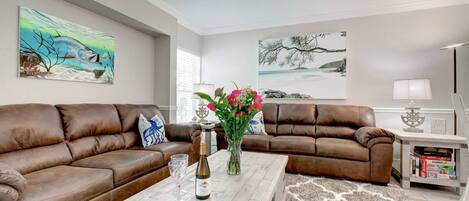 Beautiful furnishing in the living room.  The sofa on the left is a sleeper.