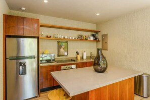 Fully equipped kitchen w/all you'll need to prepare meals at home