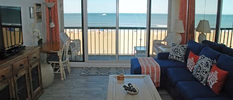Relax in your living room while enjoying the sites and sounds of the beach.