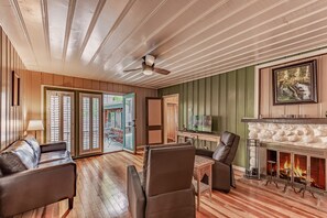 Cozy living room with fireplace — the perfect place to gather.