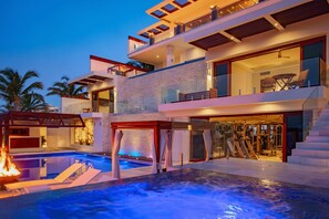 Patio with infinity edge pool