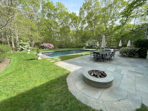 Firepit, dining and pool/spa area