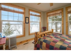 Old Bear bedroom.  5 giant windows all look out to the lake