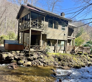 Private hot tub and 3 decks surrounded by the beautiful stream