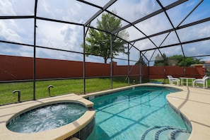 Spa and pool showing the pool enclosure