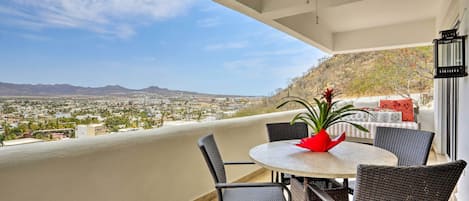 Take in the views of the mountains and city from the balcony.