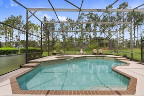 Oversized pool and spa with deck over looking golf course 