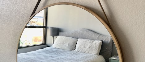 Comfy queen Bed!  with wall-to-wall windows to enjoy sunsets and clouds! 