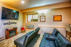 Home Theater Room Home Theater Room Basement features a home theater room with wet bar and game room!