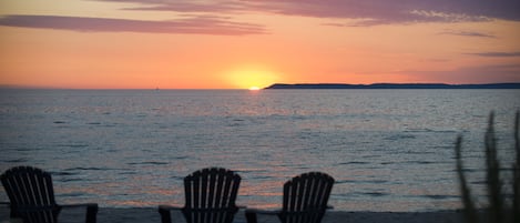 Sunset on the Solstice,  on the tip of North Manitou Island – Good Harbor Bay      

