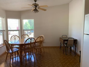 Dining area is bright and has seating for 10. 