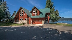 Front view of house from drive way.  guest room shared balcony on the right.