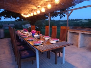 Terrace lit at night.