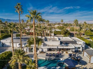 Your exclusive Palm Springs retreat spans almost 4,000sqft on nearly a half acre