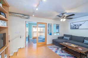 Split-level condo has living room, kitchen, second bedroom and bathroom on floor 2.