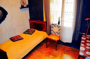 Bed beside Window
