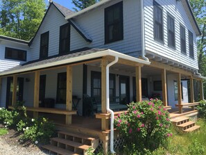 Wrap around porch is ideal for dining out.