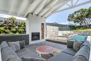 Comfortable outdoor living, with wood fireplace