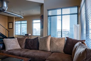 Suede pillows and sofa bed that can sleep two people