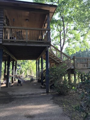 Swings and hammock underneath cabin