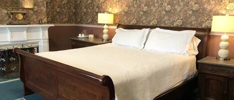 Room 3: King bed, adjoins room 4 as a suite, private unattached 1.5 bath, 2nd fl