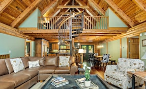 Spiral staircase leading to loft.