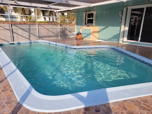 Screen enclosed HEATED pool.