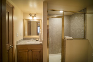 Master bathroom with free standing shower and second vanity