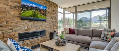 Comfortable Contemporary Furnishings and a 65" Smart TV with Apple TV