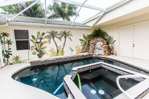 Pool in the courtyard with water fall and spa which is completely private!