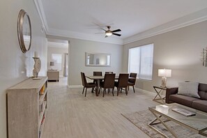 Enter the beautifully designed family and dining room.