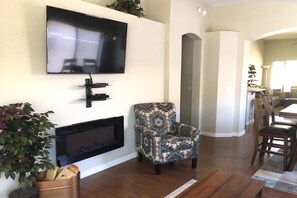 Nice size living room that everyone can cozy up to with the new TCL 55 inch Smar