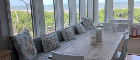 Large dining table with ocean views