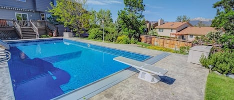 Incredible private pool with diving board and water slide! Pikes peak views from poolside!
