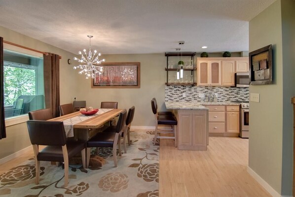 Wonderful updated kitchen with stainless appliances and wine fridge
