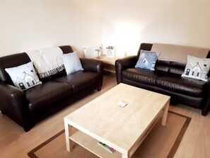 Living room with 1 sofa bed