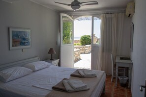 Double bedroom opening to the pool area