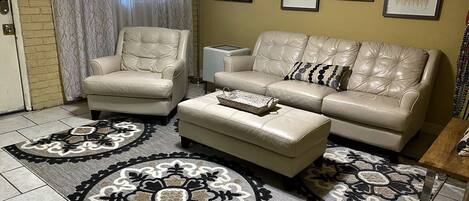 Designer leather couches to kick back and relax.