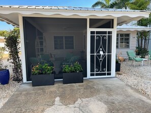 Brand  New Florida Room welcomes you to Flamingo Cottage; Fine Mesh screening 