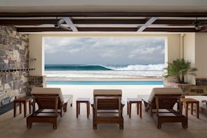 Watch the waves from your private patio