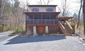 Screened porch & deck facing the river